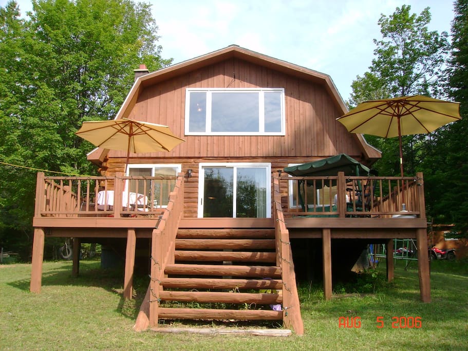 log cabin facing river